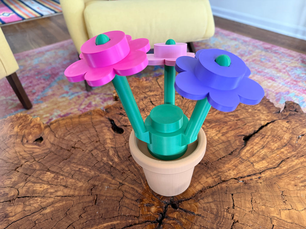 Colorful flower-shaped bouquets on a wooden surface