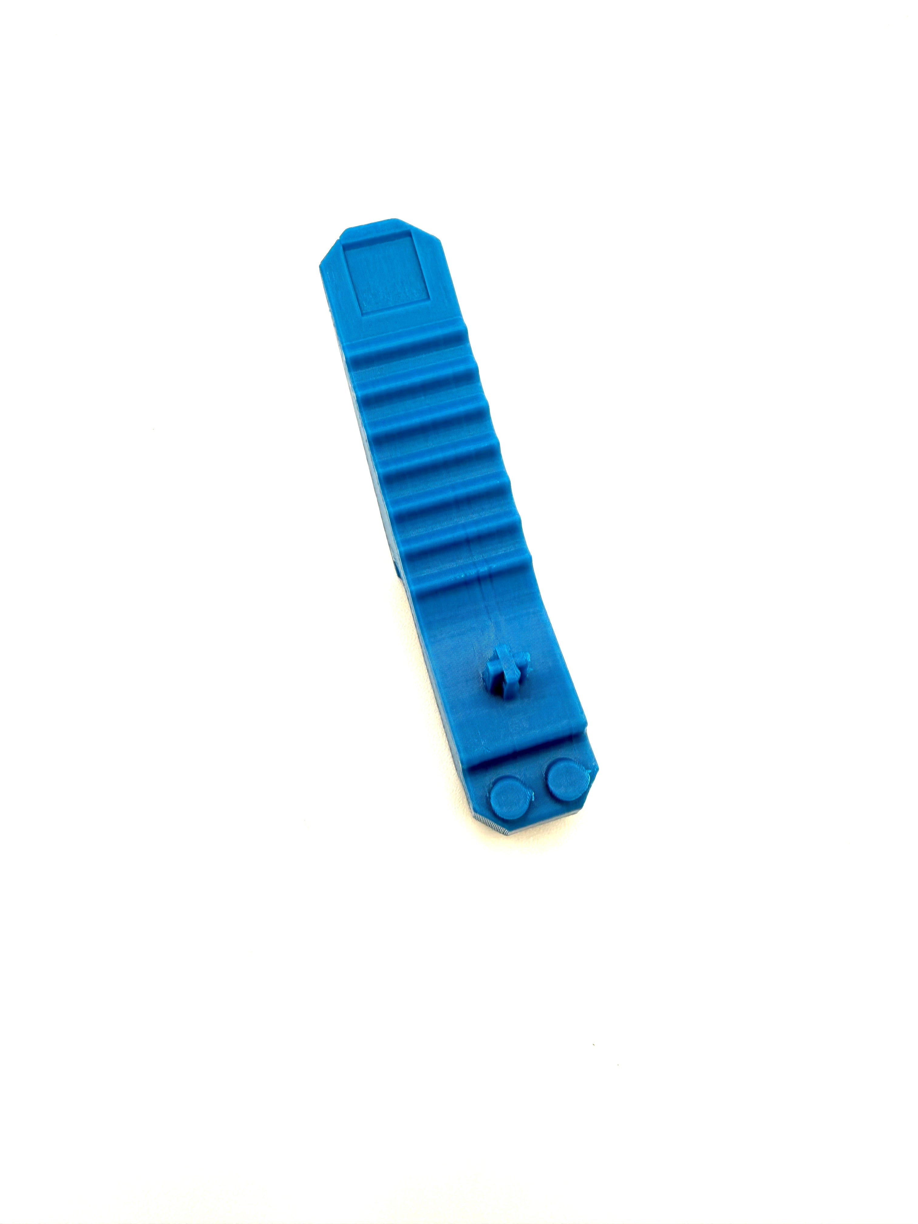 Blue plastic tool on a white background