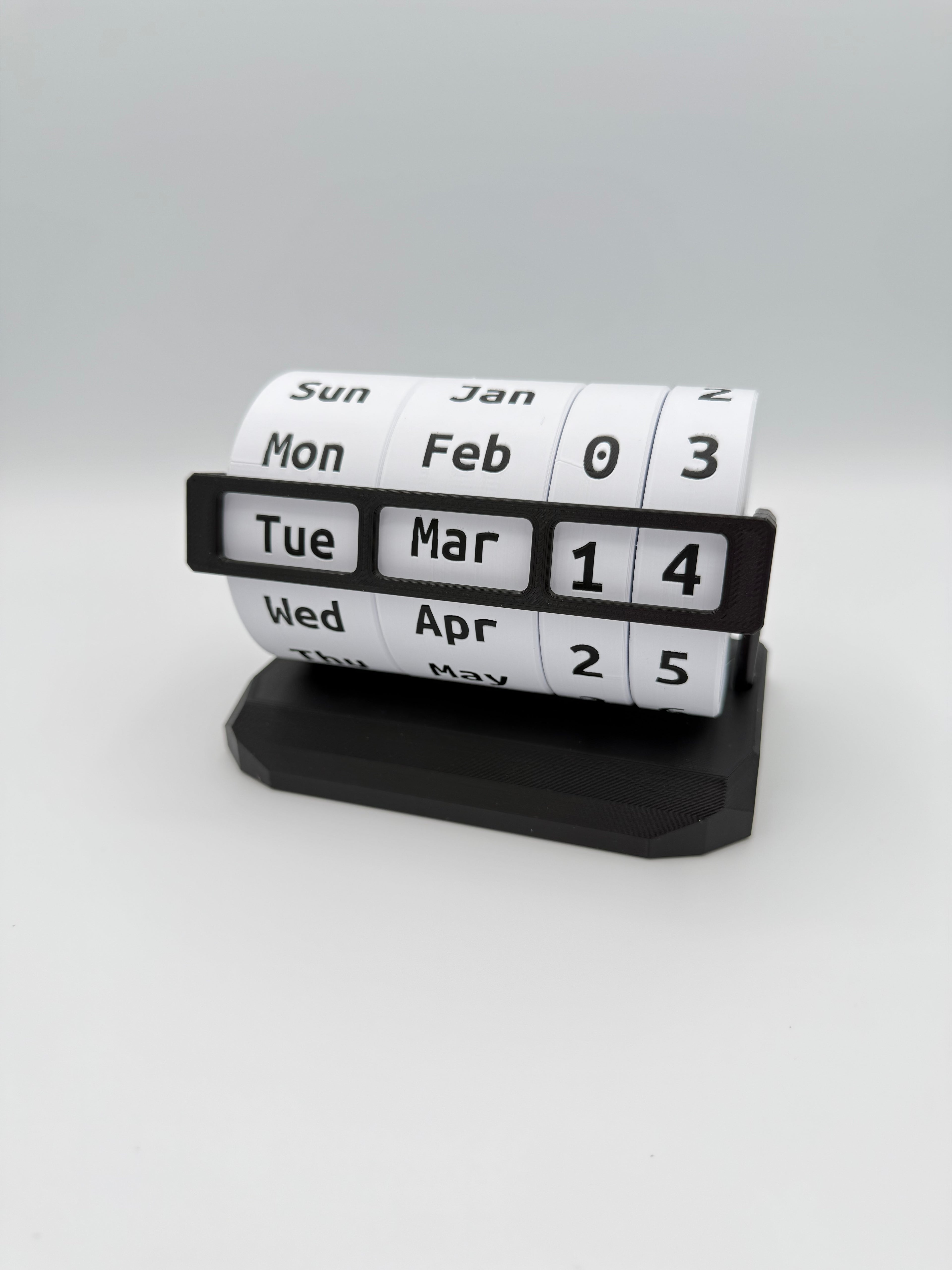 Calendar roll with black holder on a white background